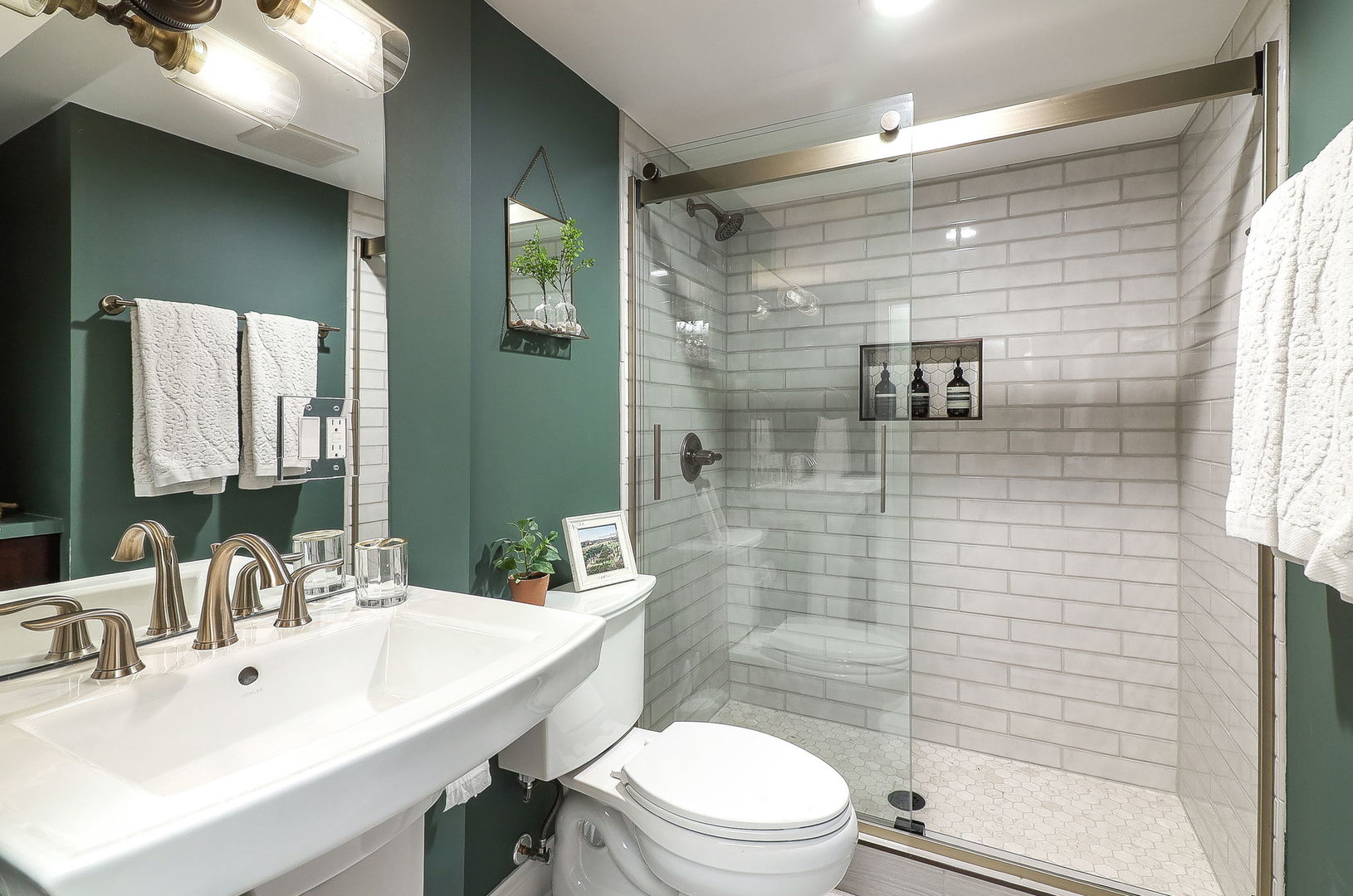 133 South Williston Street Wheaton, IL 60187 - Photo 31 of 43 a bathroom with a sink a toilet and shower