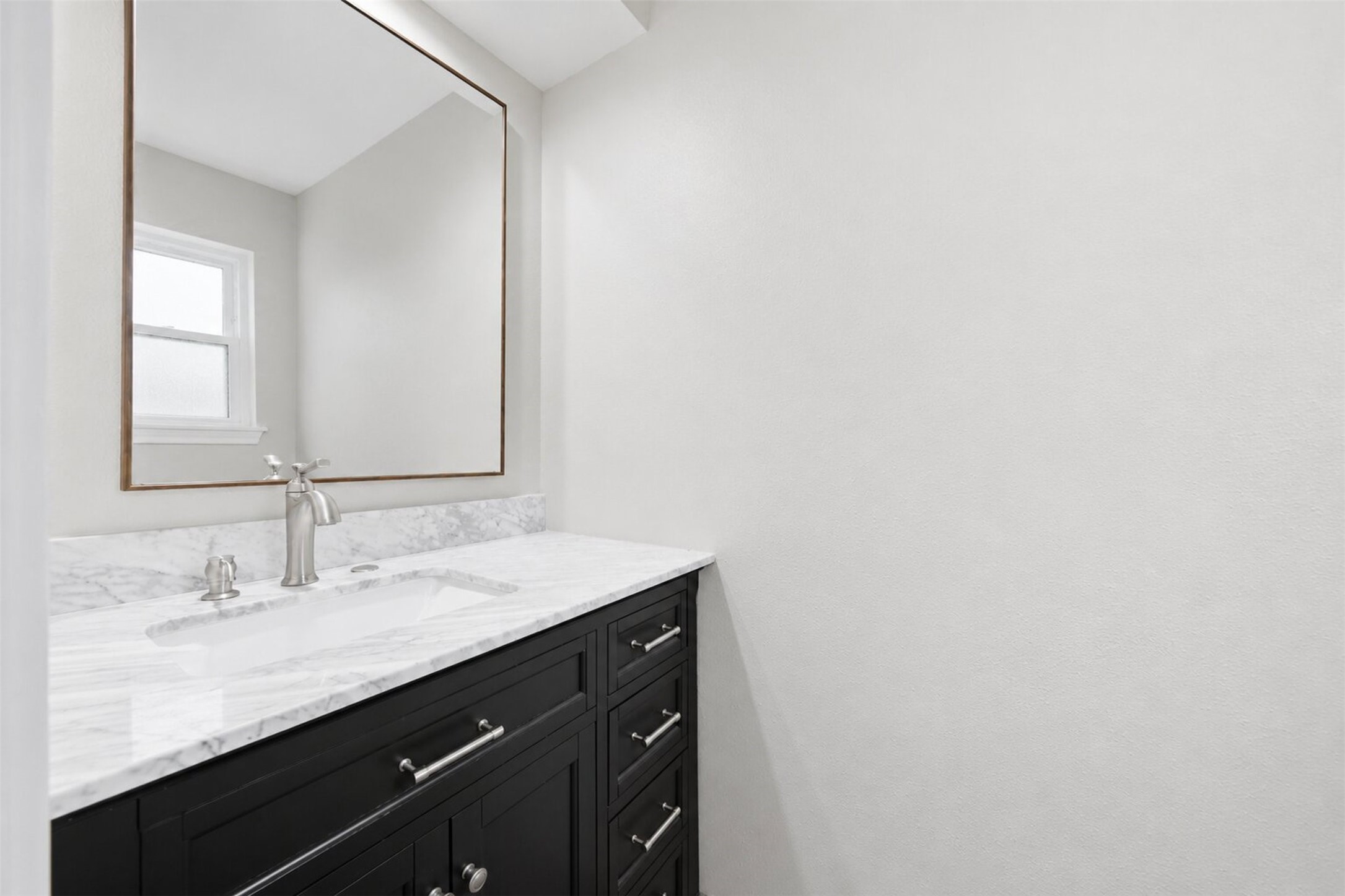 15414 Ripplestream Drive Houston, TX 77068 - Photo 18 of 41 Half bath conveniently on the first floor.