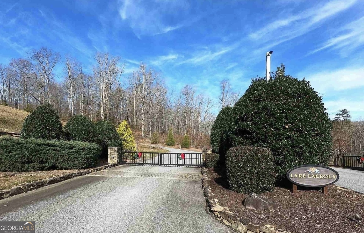 58 Mountainside Drive Cleveland, GA 30528 - Photo 14 of 30 a backyard of a house with a yard and outdoor seating