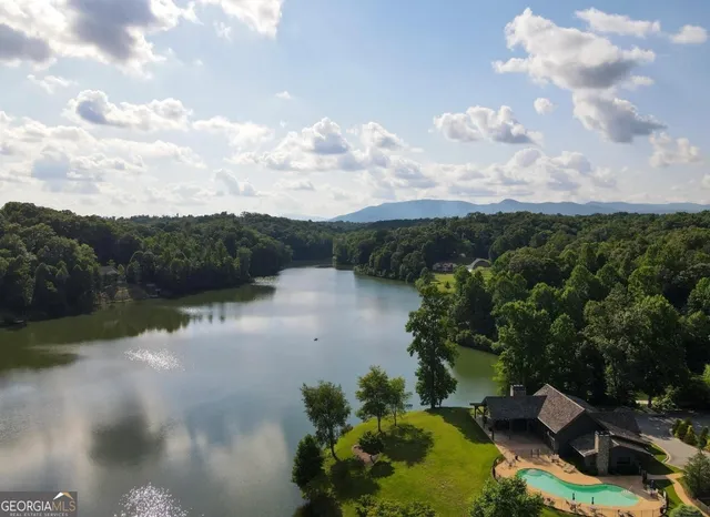 a view of a chair and table in front of a house