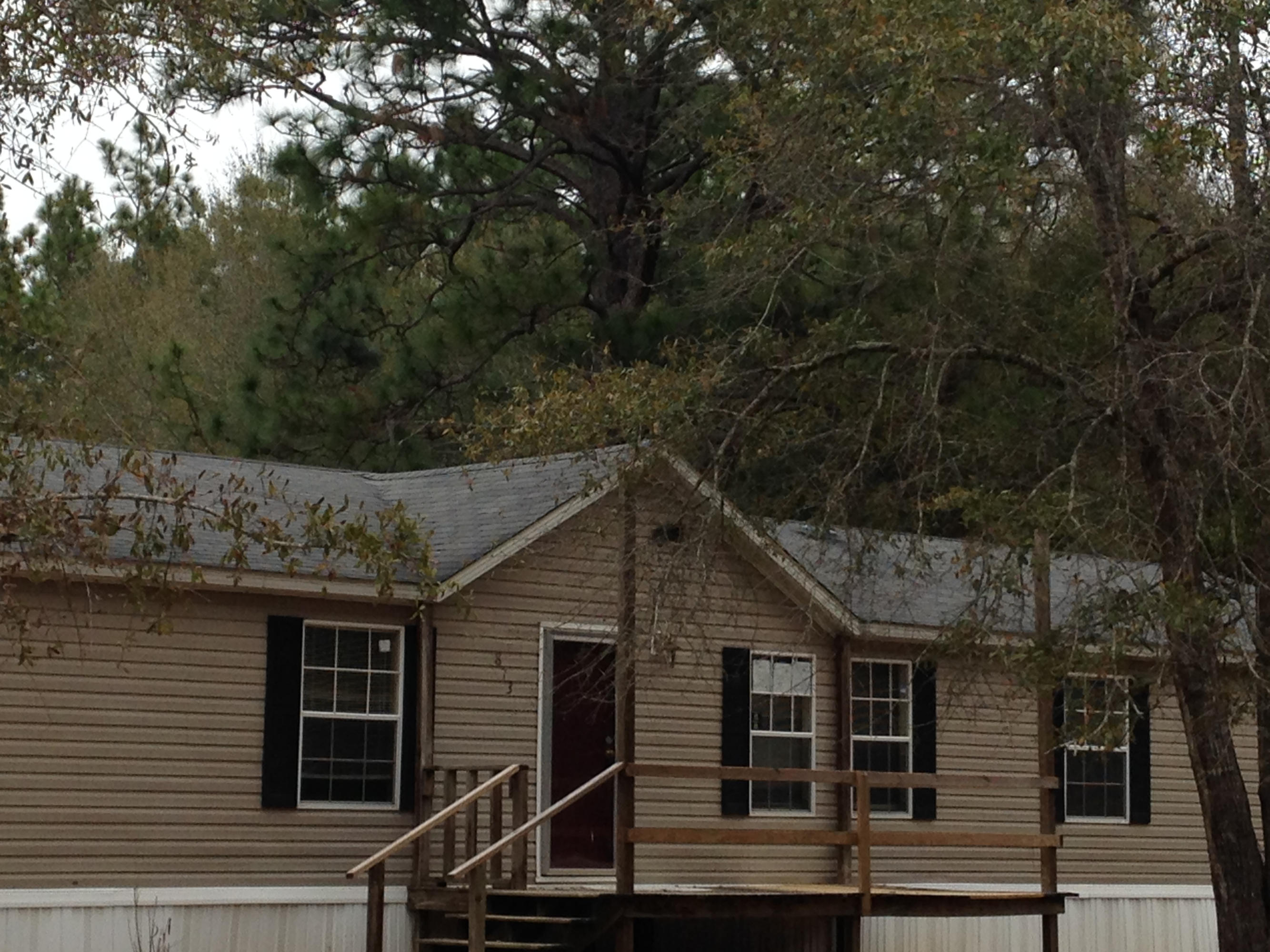 873 Lighthouse Church Road Holt, FL 32564 - Photo 2 of 18 a view of a house with a tree