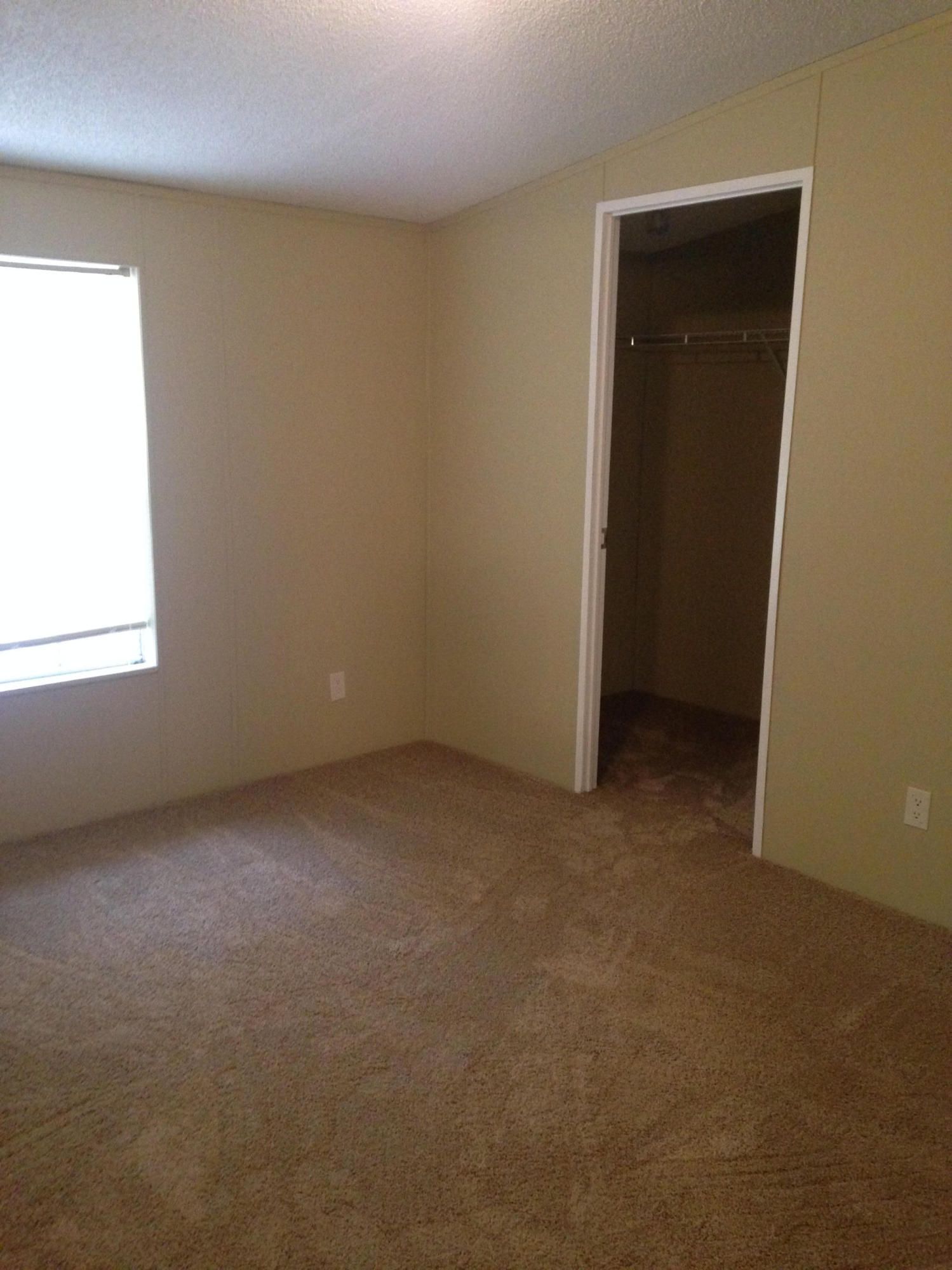 873 Lighthouse Church Road Holt, FL 32564 - Photo 14 of 18 an empty room with windows and closet