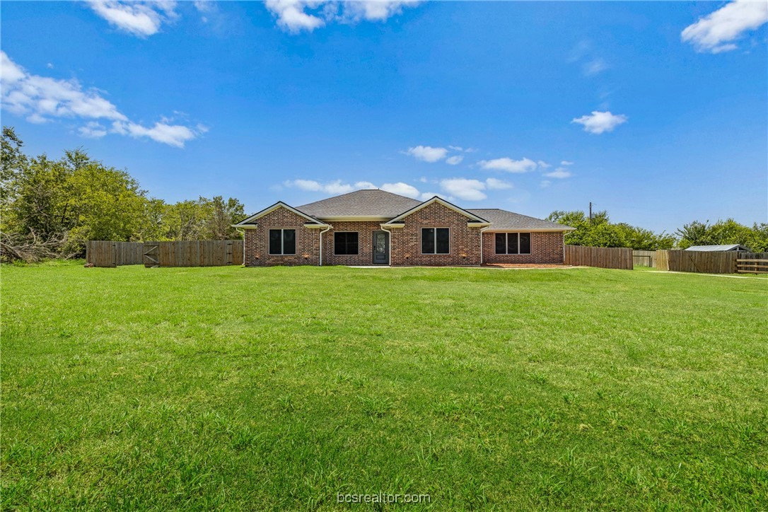1 Raven Drive Bryan, TX 77808 - Photo 1 of 1 a view of a house with a big yard