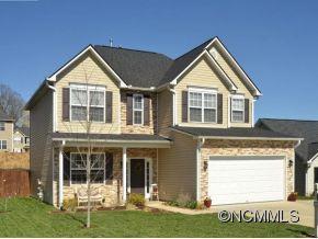 306 Lumber River Road Fletcher, NC 28732 - Photo 1 of 15 a view of a house with wooden deck and a yard