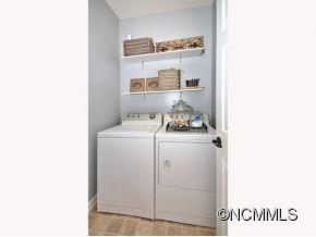 306 Lumber River Road Fletcher, NC 28732 - Photo 13 of 15 a utility room with dryer and washer