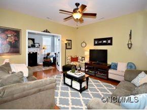 306 Lumber River Road Fletcher, NC 28732 - Photo 4 of 15 a living room with furniture and a flat screen tv