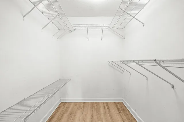 a view of a room with racks on the wall