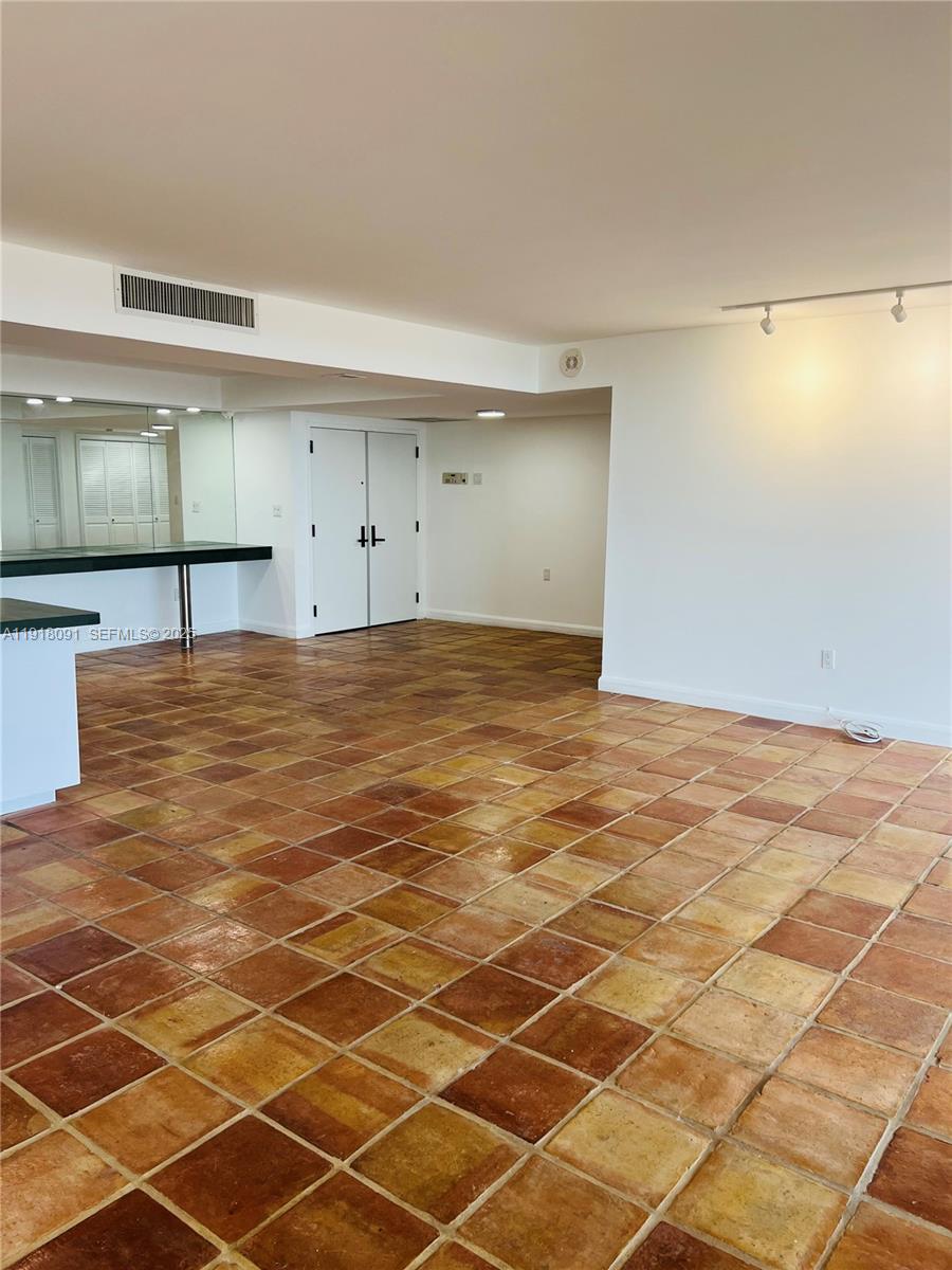 1 Grove Isle Drive, Unit A405 Miami, FL 33133 - Photo 11 of 21 a view of a room with an empty space