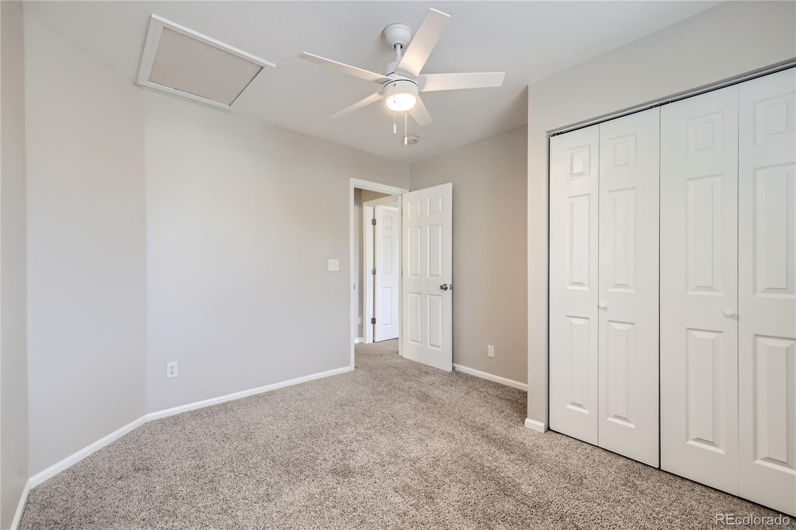 1552 Spring Water Place Highlands Ranch, CO 80129 - Photo 19 of 28 wooden floor in an empty room