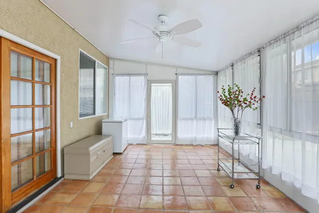 a bathroom with a tub and shower