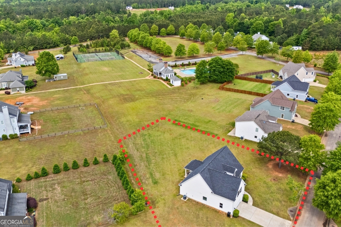 1641 County Road Lanett, AL 36863 - Photo 25 of 30 Aerial view of home with Clubhouse and Community pool.