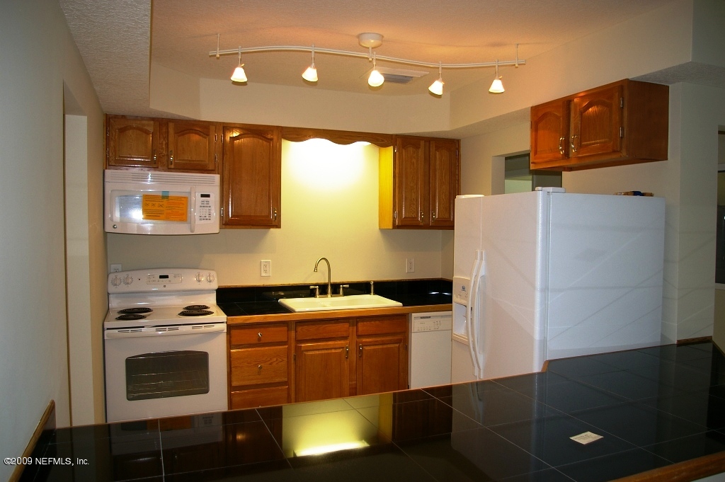 2715 Springmont Street Jacksonville, FL 32207 - Photo 2 of 14 NEW KITCHEN WITH GRANITE COUNTERTOPS