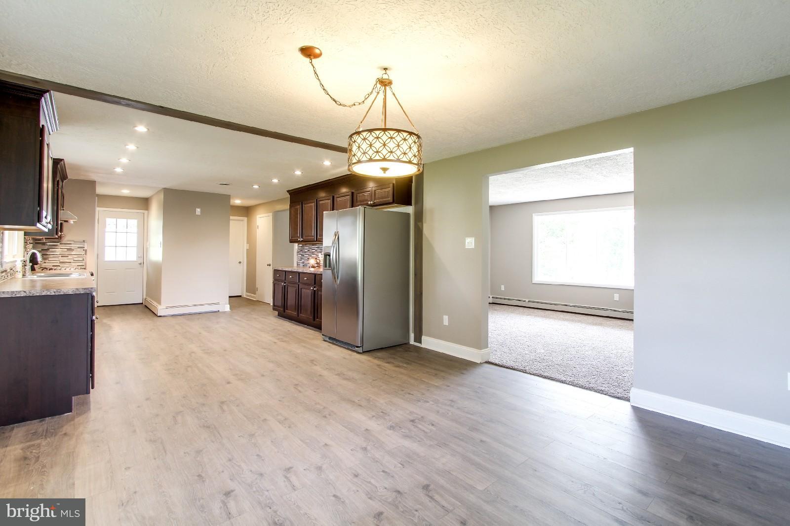 482 Highland Road Red Lion, PA 17356 - Photo 13 of 30 Dining area view into kitchen and living areas.