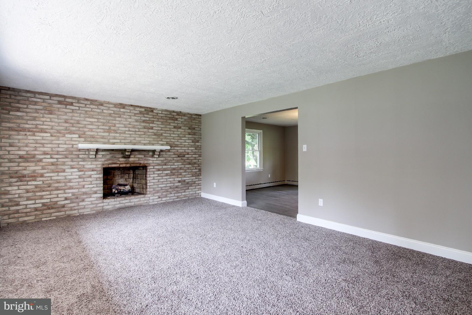 482 Highland Road Red Lion, PA 17356 - Photo 8 of 30 Living room with fireplace