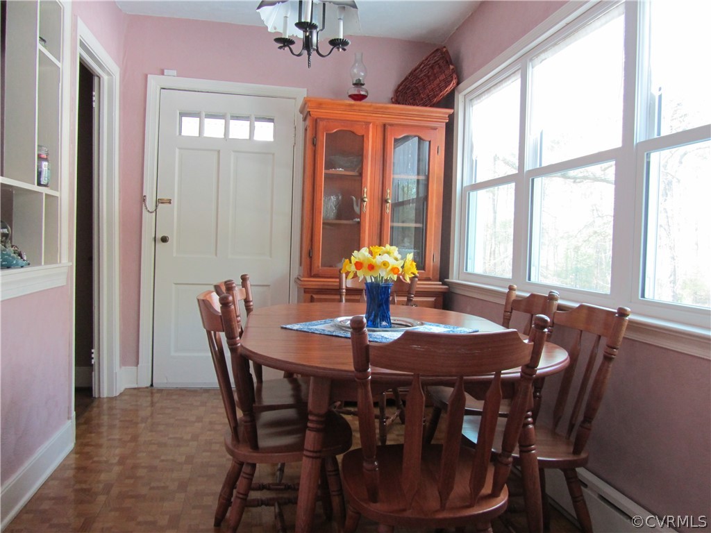 11432 Hanover Courthouse Road Hanover, VA 23069 - Photo 12 of 22 a dining room with furniture and window
