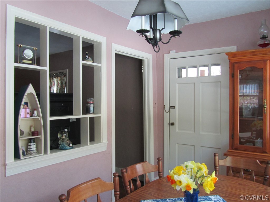 11432 Hanover Courthouse Road Hanover, VA 23069 - Photo 13 of 22 a view of a hallway with a chandelier
