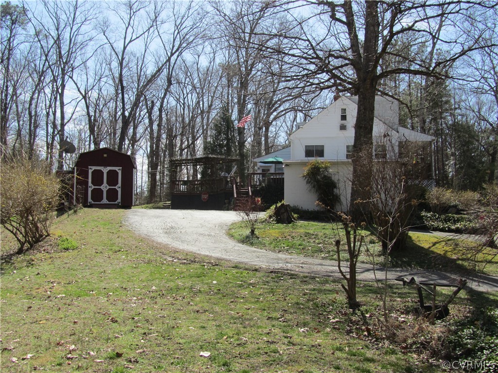 11432 Hanover Courthouse Road Hanover, VA 23069 - Photo 8 of 22 a view of a yard and front view of a house