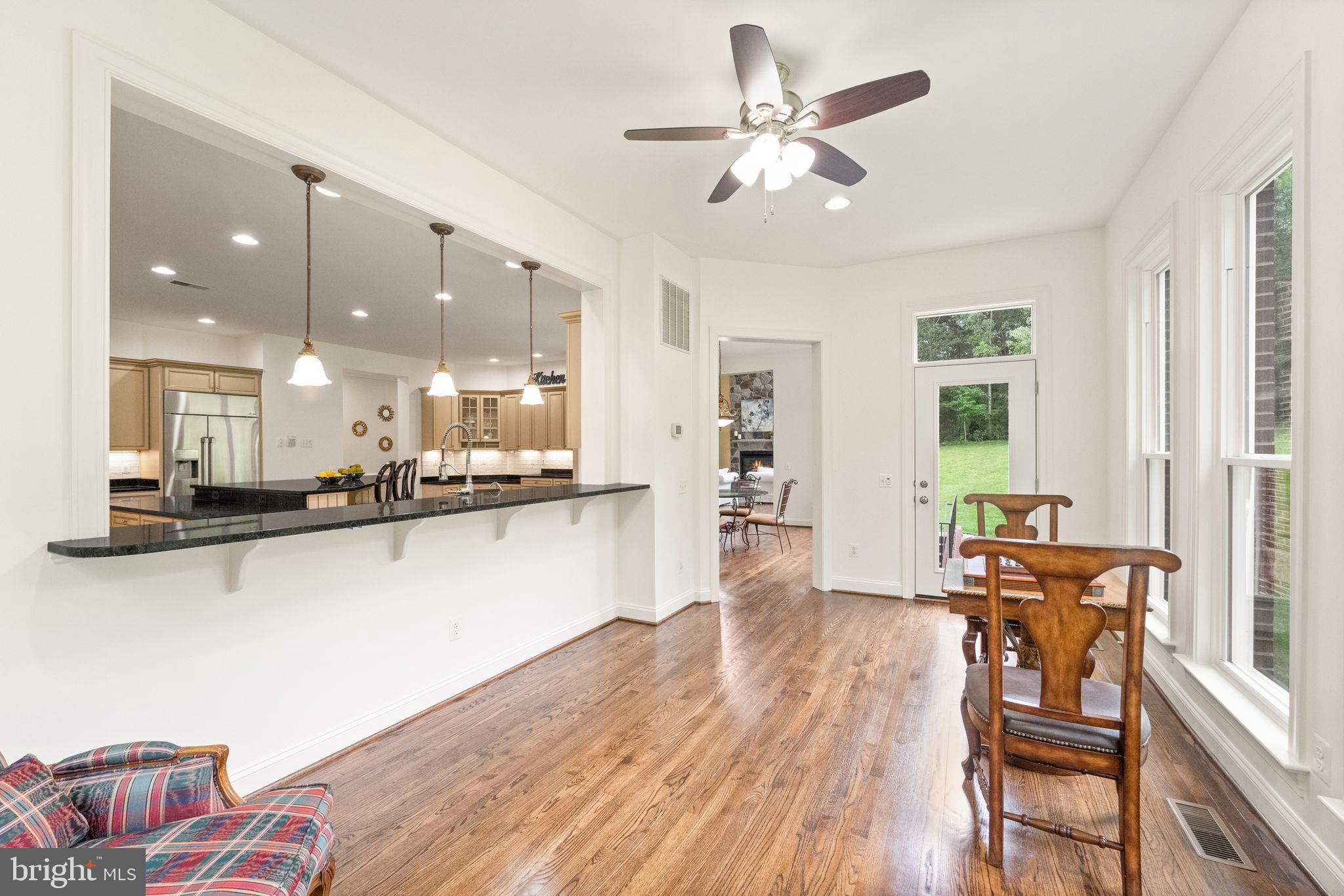 27712 Paddock Trail Place Chantilly, VA 20152 - Photo 32 of 106 Sunroom with door to back yard