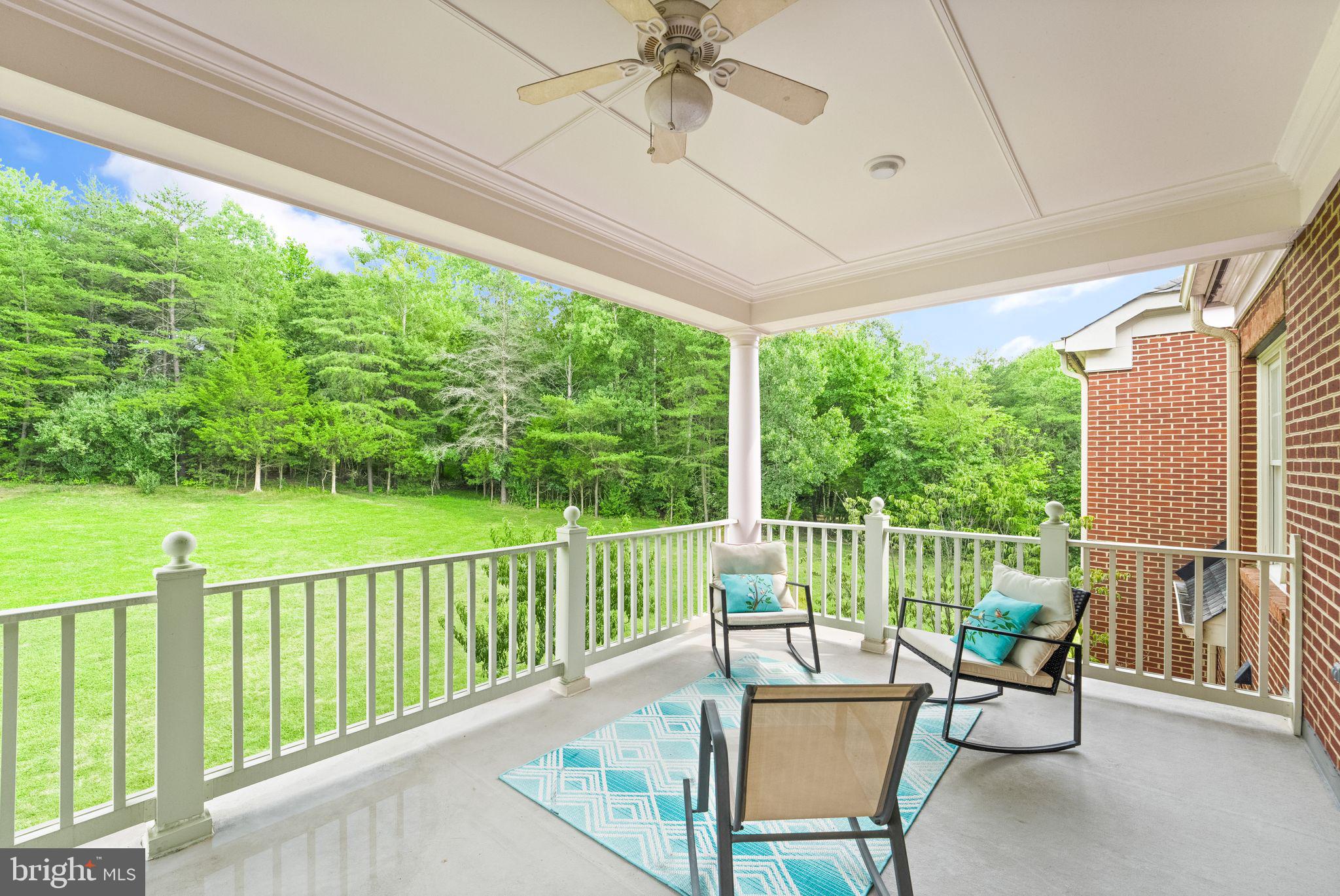 27712 Paddock Trail Place Chantilly, VA 20152 - Photo 48 of 106 Covered veranda off primary bedroom