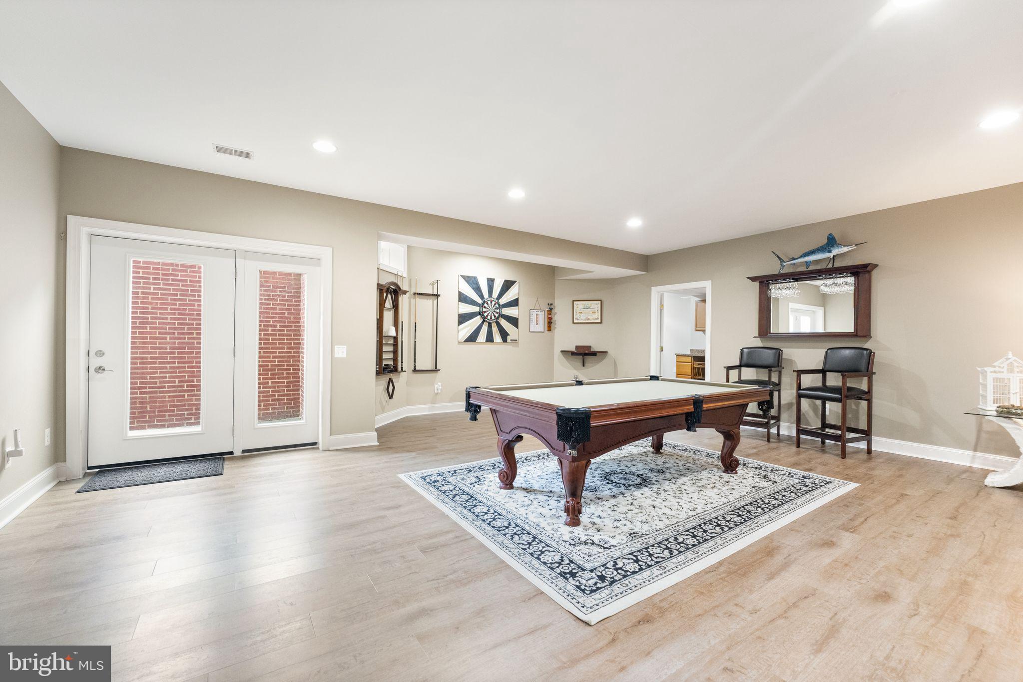 27712 Paddock Trail Place Chantilly, VA 20152 - Photo 78 of 106 Large rec room with high qualty LVP