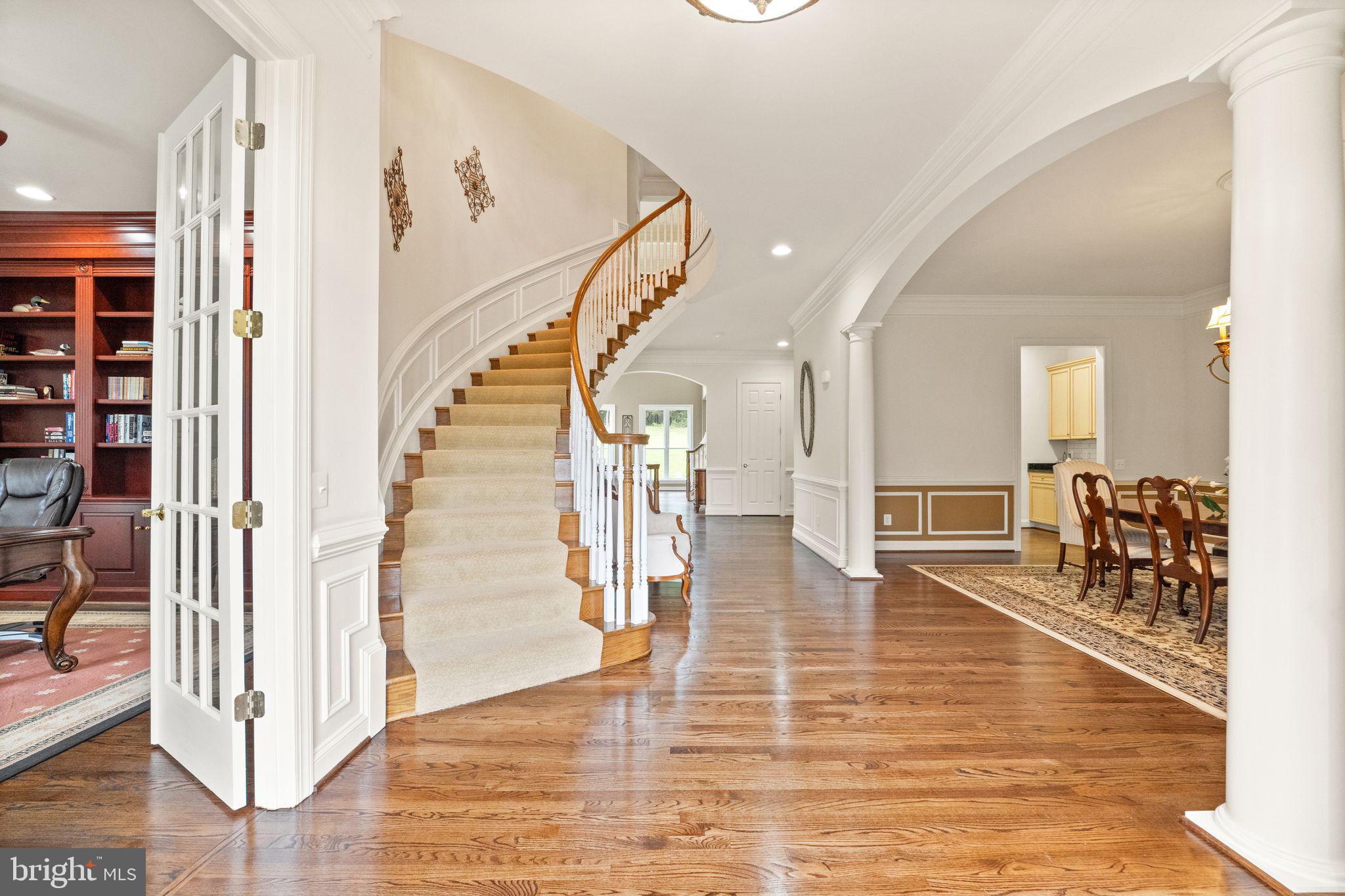27712 Paddock Trail Place Chantilly, VA 20152 - Photo 10 of 106 Foyer with curved staircase