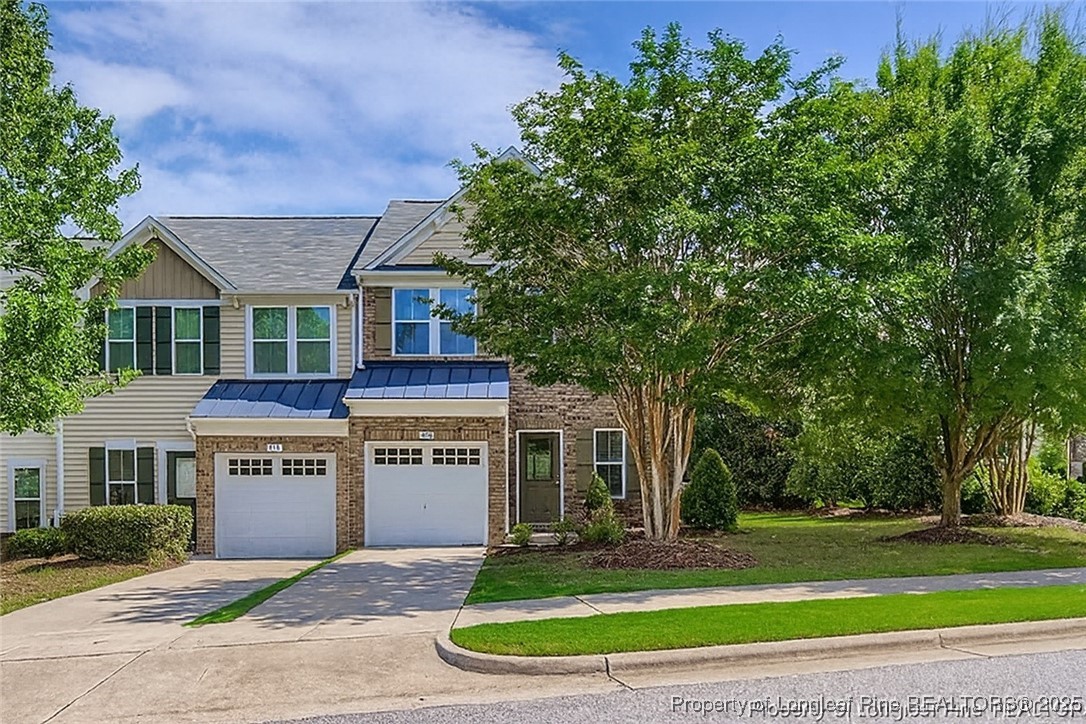 408 Panorama View Loop Cary, NC 27519 - Photo 1 of 28 a view of a house with a yard and large tree