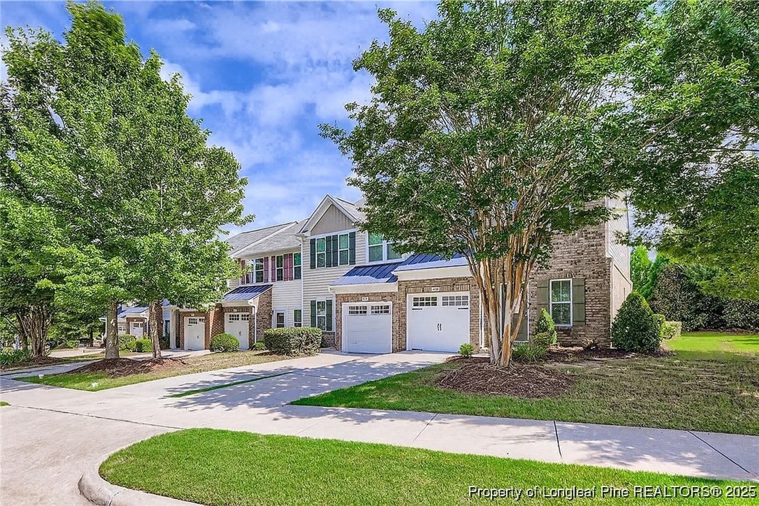 408 Panorama View Loop Cary, NC 27519 - Photo 2 of 28 a front view of a house with a garden