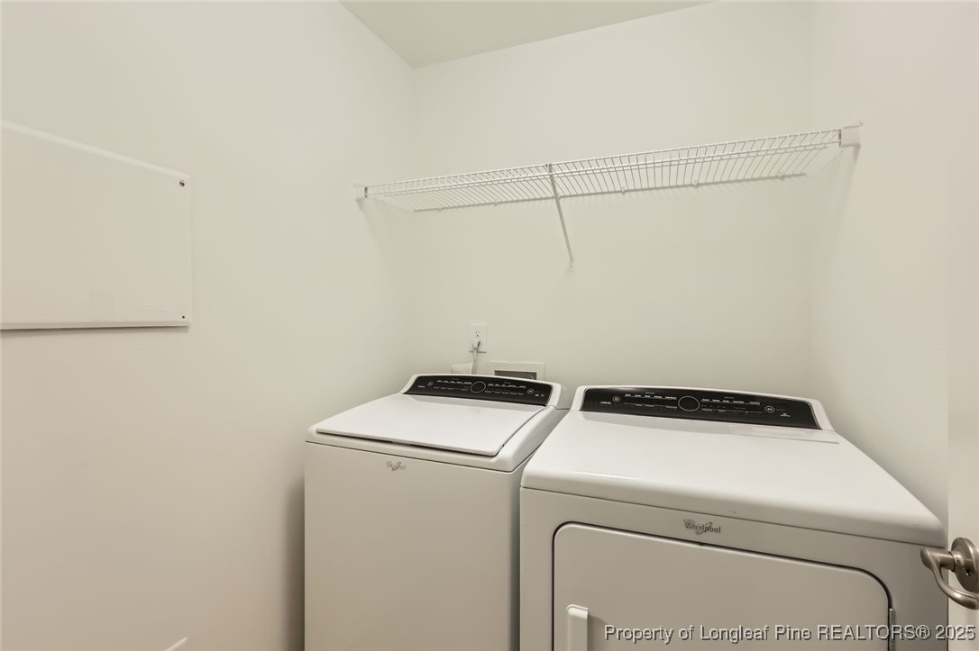 408 Panorama View Loop Cary, NC 27519 - Photo 23 of 28 a utility room with dryer and washer