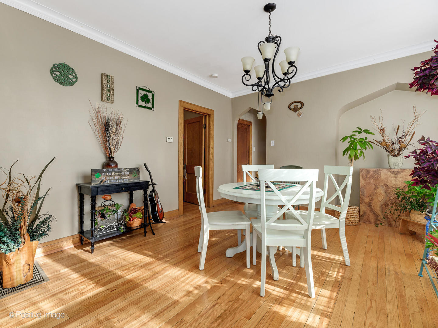 Undisclosed Address Chicago, IL 60630 - Photo 2 of 5 a view of a dining room with furniture and wooden floor