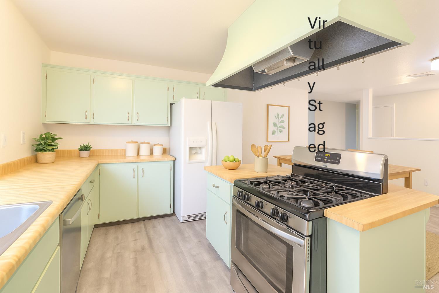 978 Eleanor Avenue Rohnert Park, CA 94928 - Photo 8 of 36 a kitchen with a stove a sink and a refrigerator