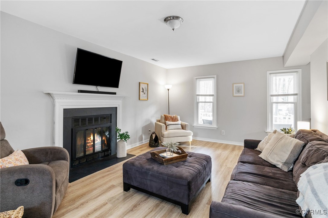 1309 Lockett Ridge Road Midlothian, VA 23114 - Photo 19 of 49 Living room with woodburning fireplace and lots of