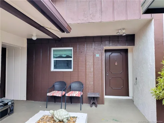 a view of a lake with houses in the back