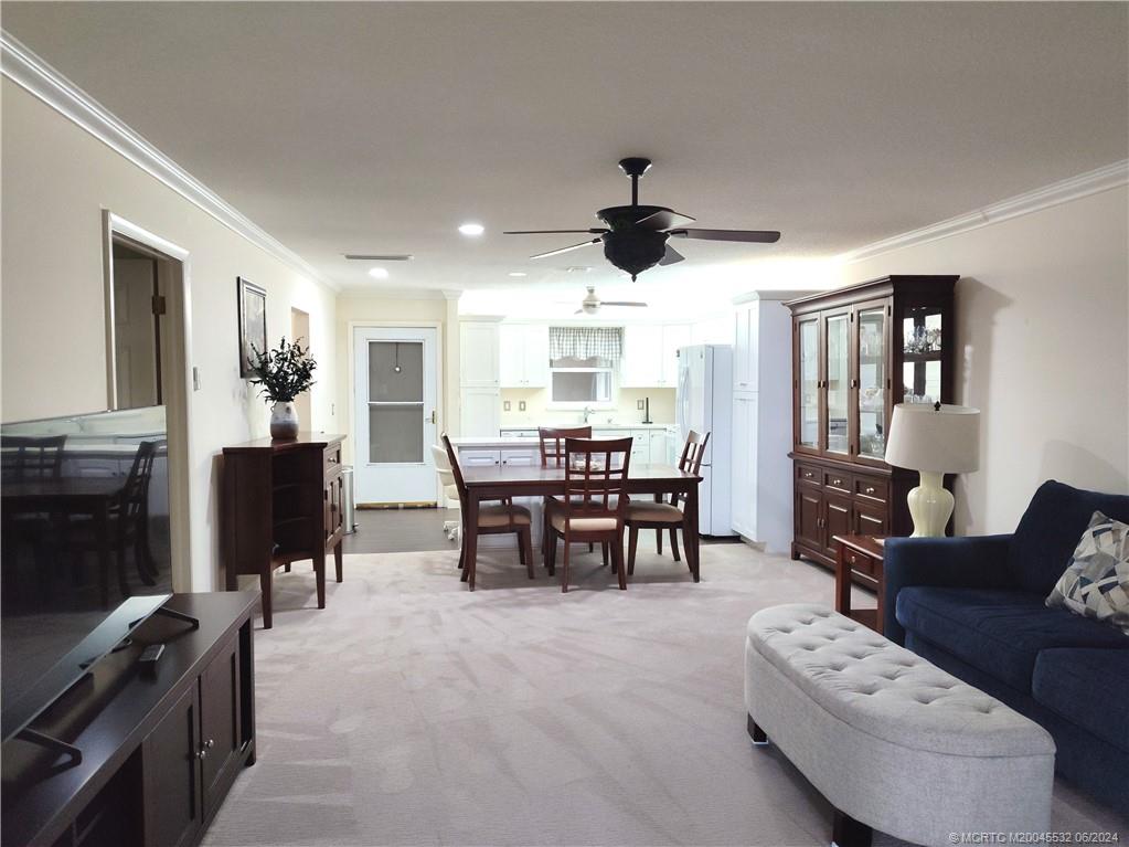 Undisclosed Address Stuart, FL 34997 - Photo 19 of 64 a view of a livingroom with furniture and a flat screen tv