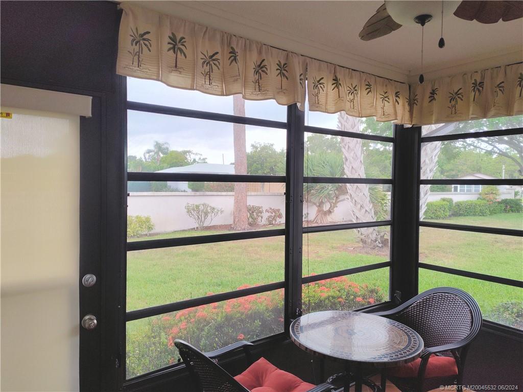 Undisclosed Address Stuart, FL 34997 - Photo 46 of 64 a view of a porch with furniture and a window