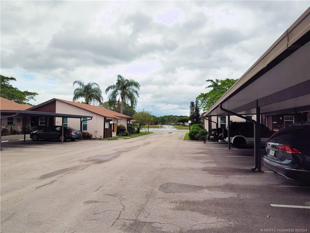 Undisclosed Address Stuart, FL 34997 - Photo 54 of 64 a view of a car park in front of house