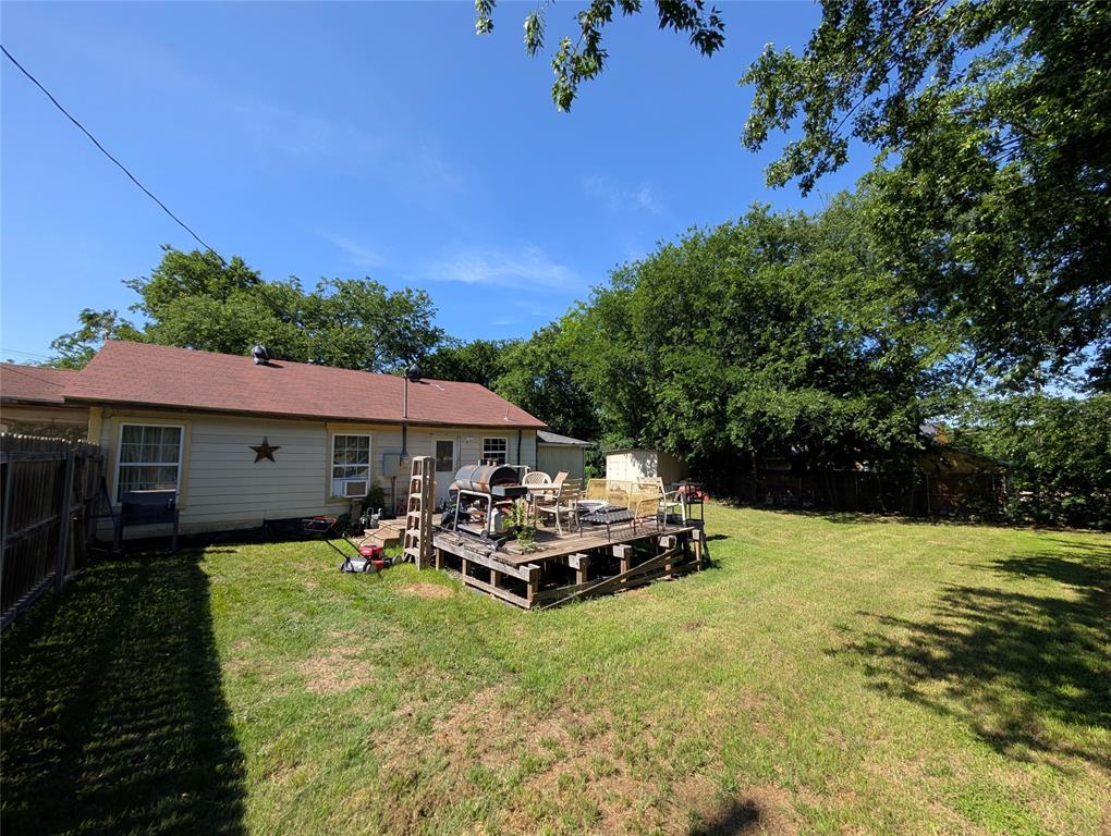 308 Short Street Mansfield, TX 76063 - Photo 17 of 21 a front view of a house with a garden and trees