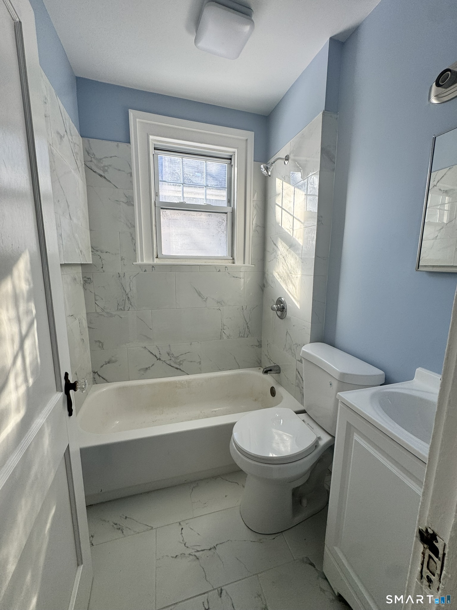 26 Lander Street New Haven, CT 06511 - Photo 12 of 26 a bathroom with a toilet and a bathtub