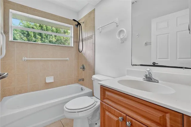 a bathroom with a sink a toilet and a bathtub