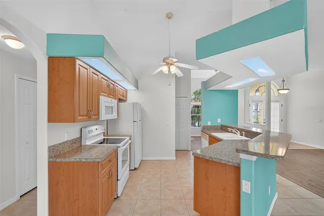 a view of a kitchen cabinets and a sink