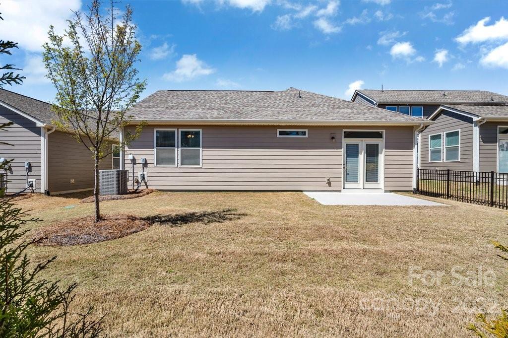 1271 Independence Street Tega Cay, SC 29708 - Photo 4 of 23 a front view of a house with a yard