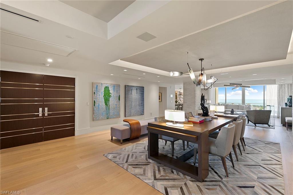 6897 Grenadier Boulevard, Unit 902 Naples, FL 34108 - Photo 3 of 50 a view of a dining room with furniture window and outside view