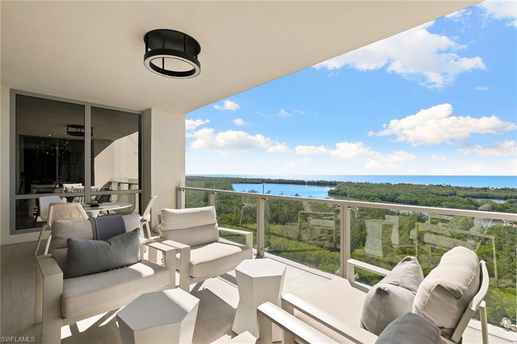 6897 Grenadier Boulevard, Unit 902 Naples, FL 34108 - Photo 41 of 50 a view of balcony with furniture