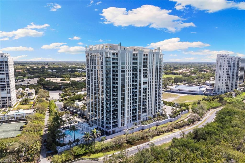 6897 Grenadier Boulevard, Unit 902 Naples, FL 34108 - Photo 50 of 50 a view of a city with tall buildings