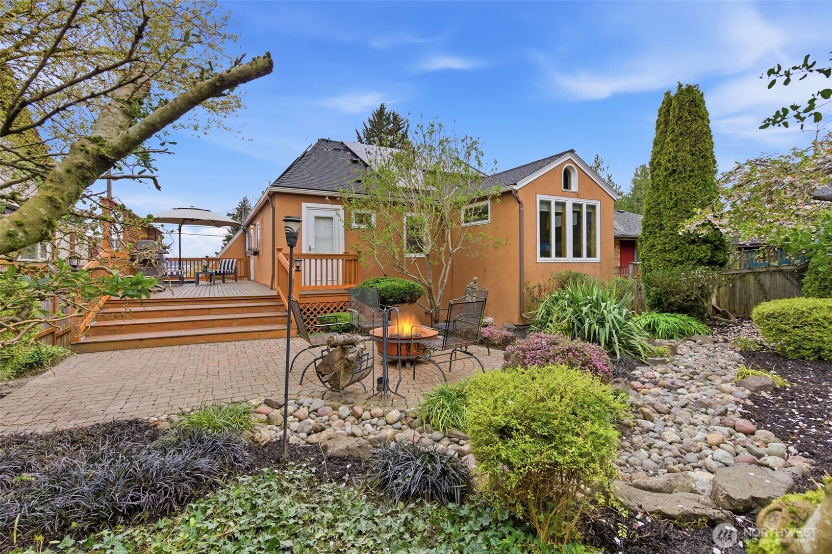9272 Fauntleroy Way Southwest Seattle, WA 98136 - Photo 29 of 35 a front view of a house with garden