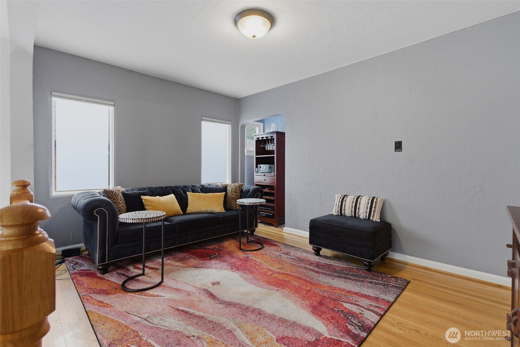 9272 Fauntleroy Way Southwest Seattle, WA 98136 - Photo 3 of 35 a living room with furniture and a rug