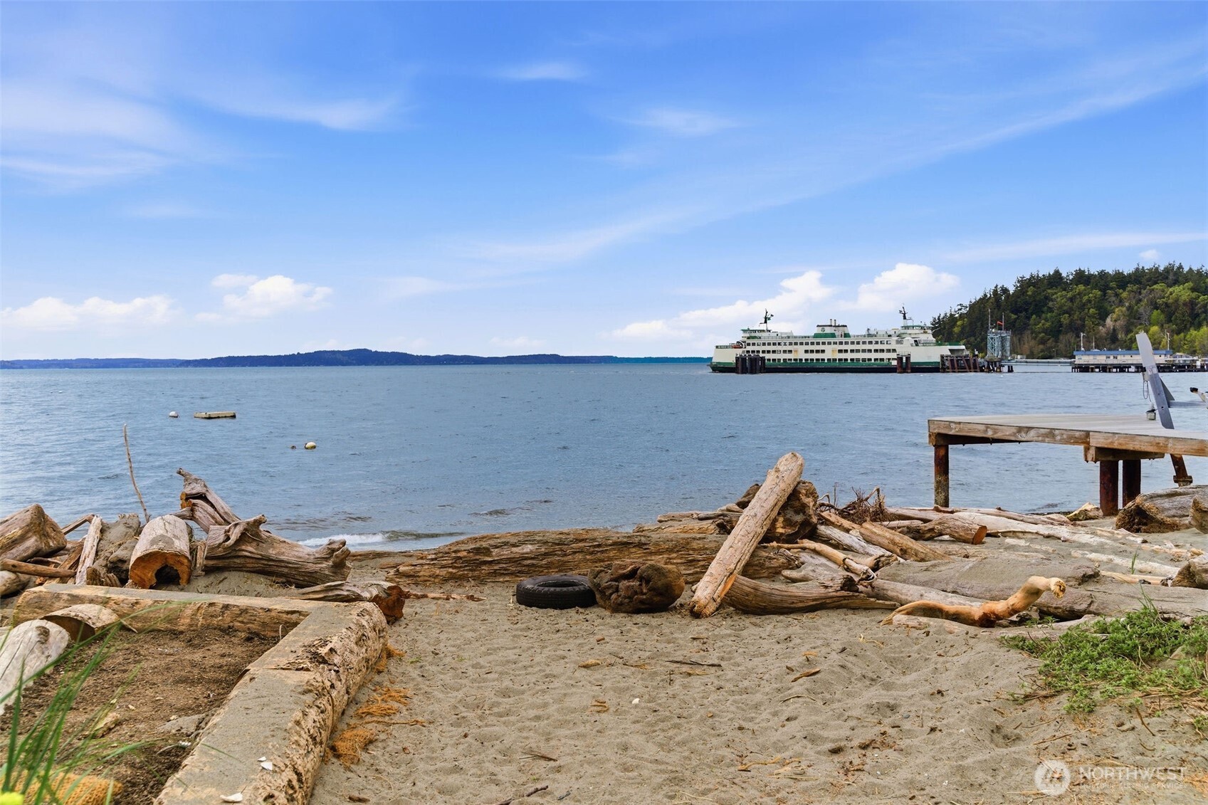 9272 Fauntleroy Way Southwest Seattle, WA 98136 - Photo 34 of 35 a view of a lake with a beach