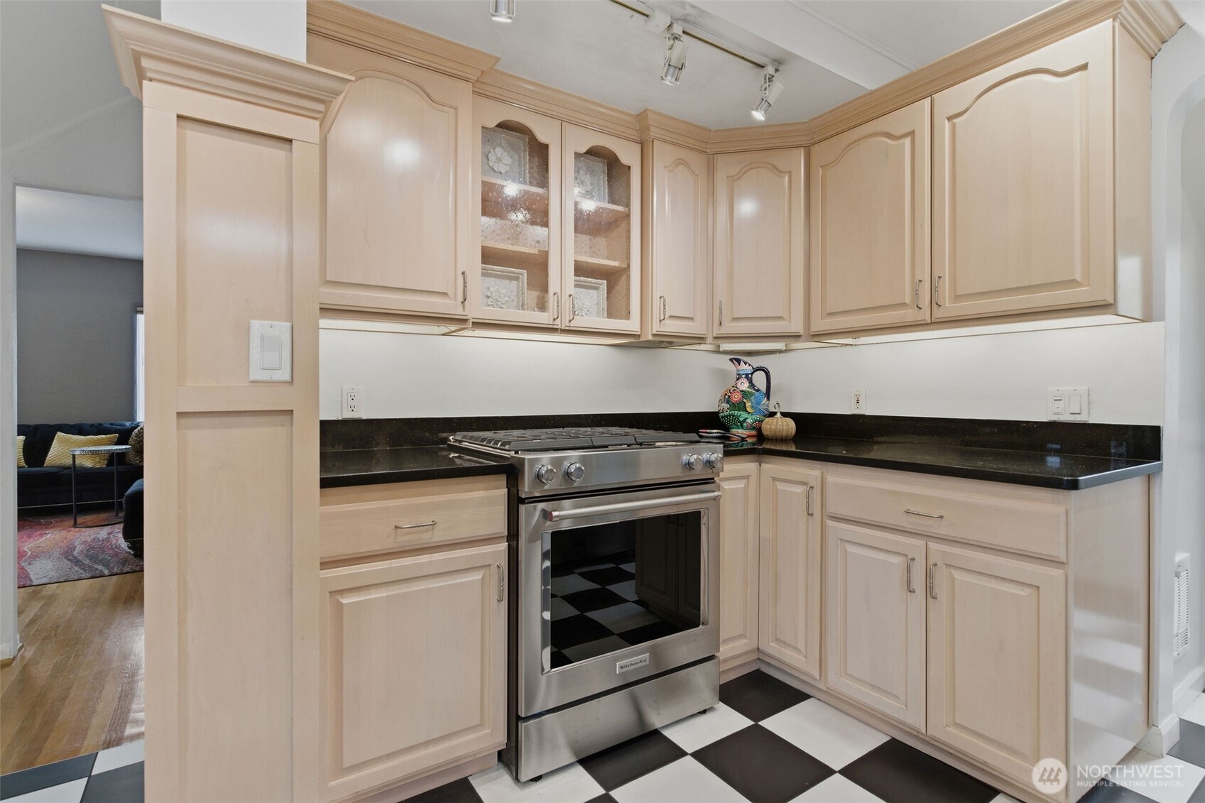 9272 Fauntleroy Way Southwest Seattle, WA 98136 - Photo 8 of 35 a kitchen with stainless steel appliances granite countertop a stove a sink and a refrigerator
