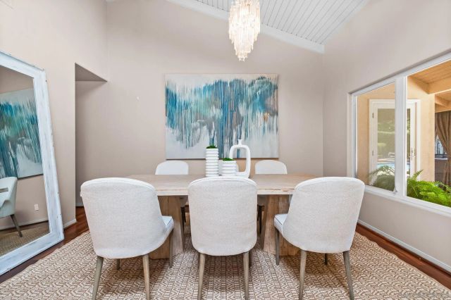 a kitchen with granite countertop stainless steel appliances and wooden cabinets