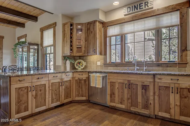 a bedroom with a bed couch and a window