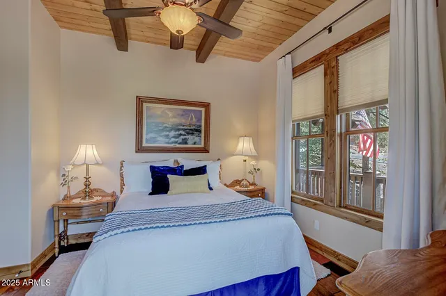 a view of a street with a tree in the background